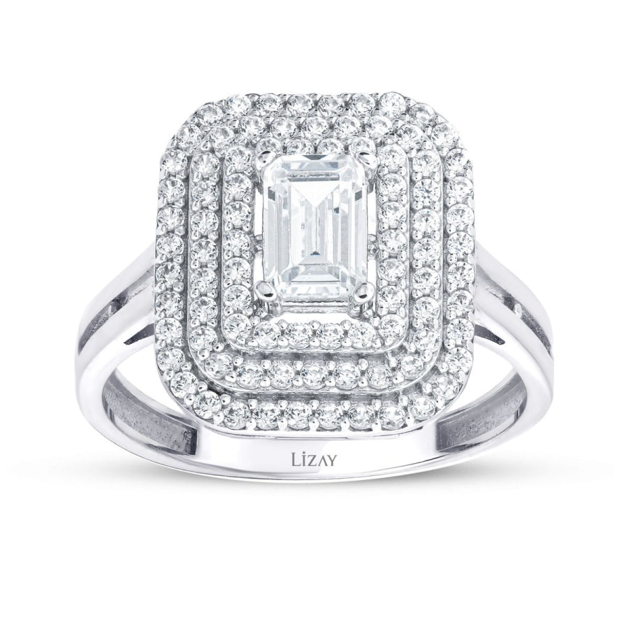 Ring mit drei Reihen Baguette-Steinen aus Gold