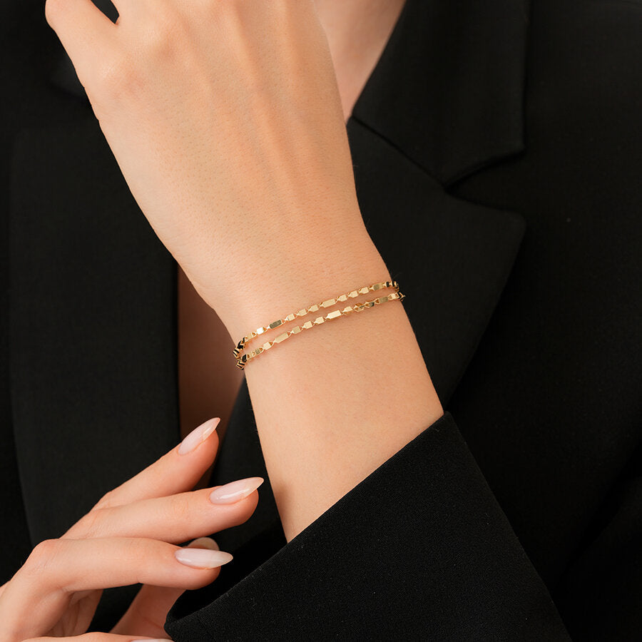 Armband mit Münzdesign aus Gold