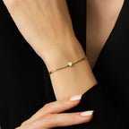 Herz-Fischgrätenarmband aus Gold