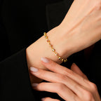 Schutzauge-Perlenarmband aus Gold