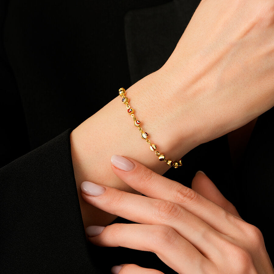 Schutzauge-Perlenarmband aus Gold
