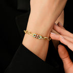 Trend-Gliederarmband mit Fuchsia-Stein aus Gold