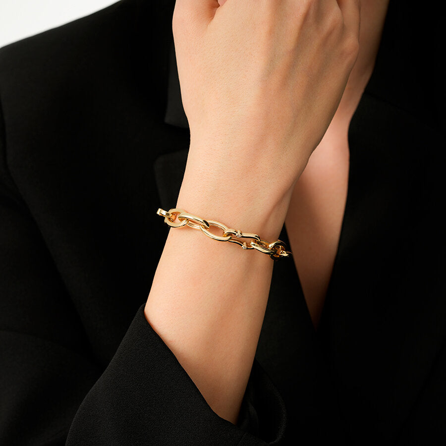 Detailreiches Gliederarmband mit Stein aus Gold