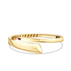 Asymmetrischer Armreif mit fuchsienfarbenem Stein aus Gold