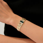 Prisma-Armband mit grünem Stein aus Gold