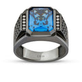 Herrenring aus Gold mit schwarzem Onyx und blauen Steinen