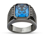 Herrenring aus Gold mit schwarzem Onyx und blauen Steinen