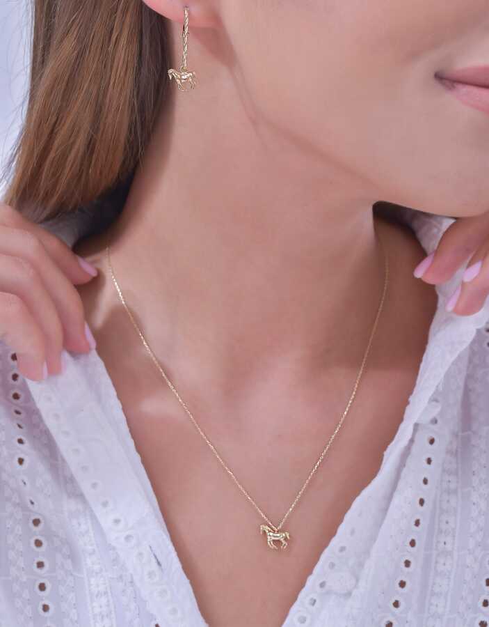 Ohrringe mit Pferdemotiv und Stein aus Gold