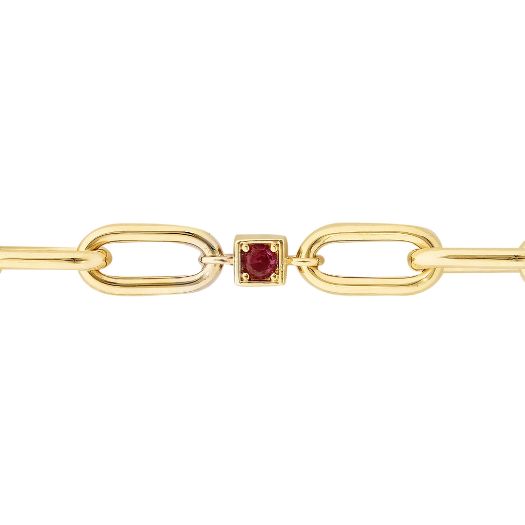 Gold Gliederarmband mit Fuchsia Stein