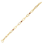 Gold Gliederarmband mit Fuchsia Stein
