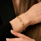 Gold Gliederarmband mit Fuchsia Stein