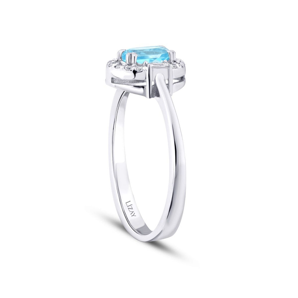 0.67 Karat Diamant Blue Topaz Baguette Ring