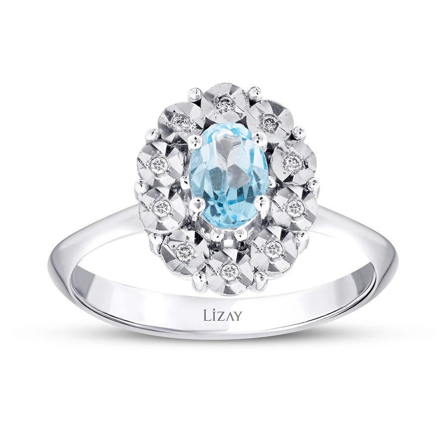 0.60 ct. Diamant Blauer Topas Ring