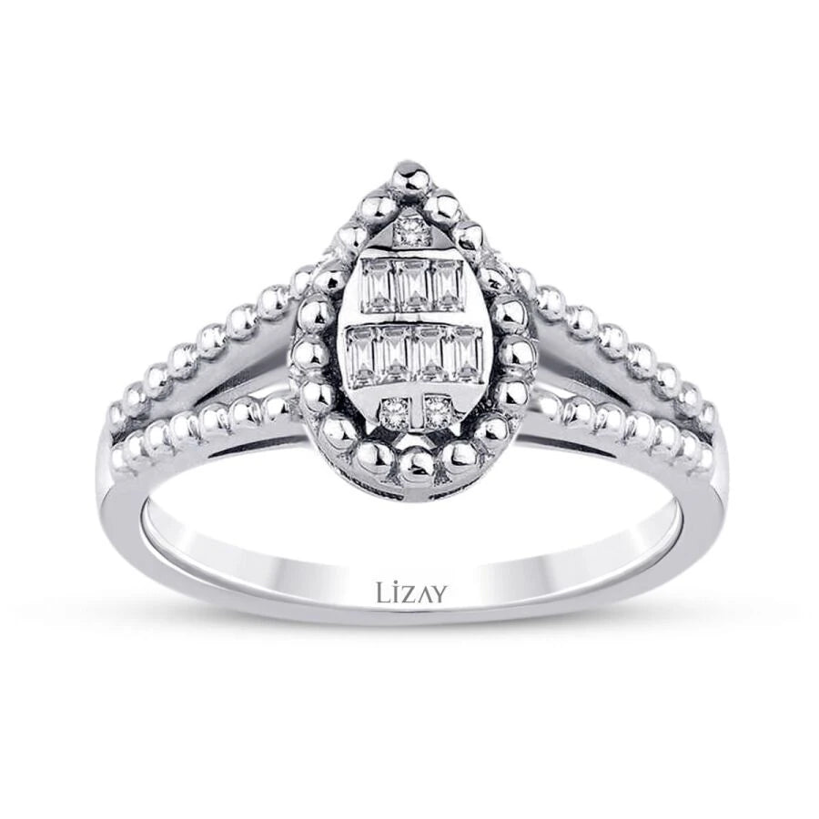 0.12 ct. Diamant Tropfen Baguette Ring